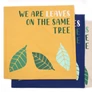Kép 1/4 - Pamut Párnahuzat Felirattal - We are Leaves - Sárga, Kék és Natúr